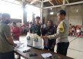 Polsek Pupuan Kawal Pembagian 8 Ton Beras untuk Warga Bantiran